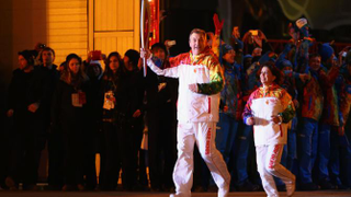 Illustration for article titled Woman Who Lit Olympic Flame Tweeted This Racist Obama Photo